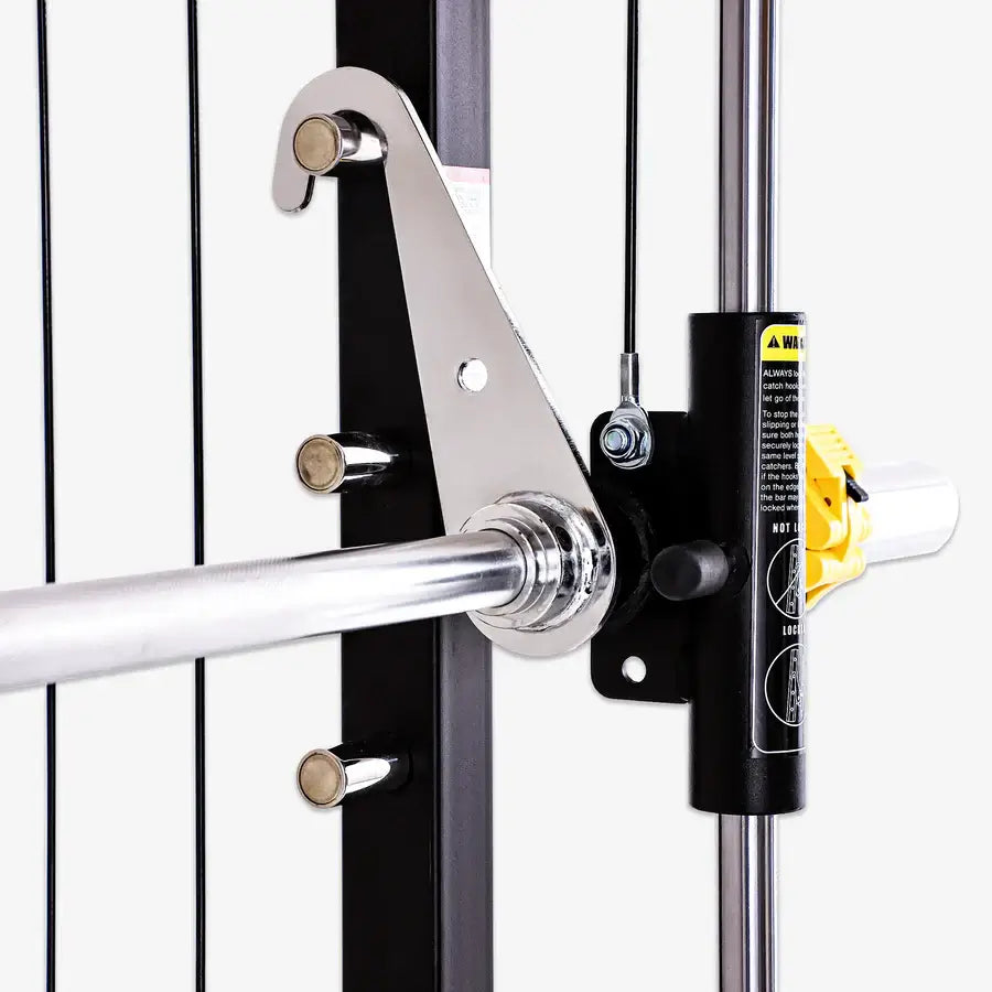 Close-up of Altas Strength Smith Machine AL-3059's bar attachment mechanism for weightlifting in Vancouver home gyms.