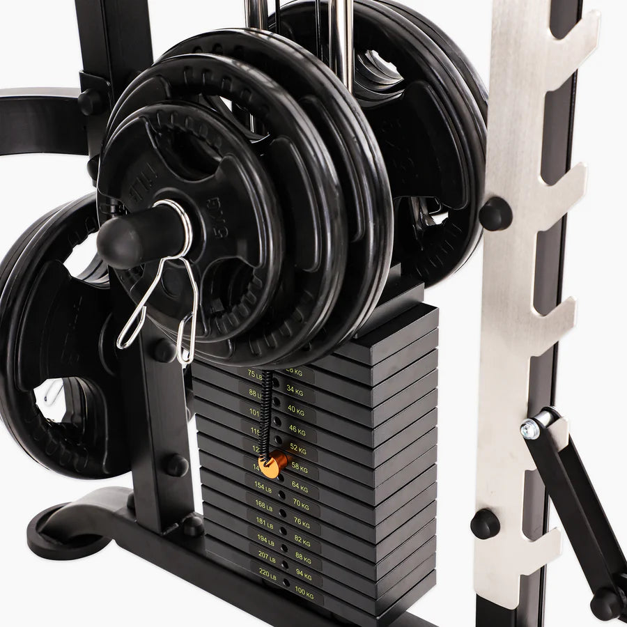 Smith machine with weight plates and adjustable weights for effective training at home or gym in Vancouver.
