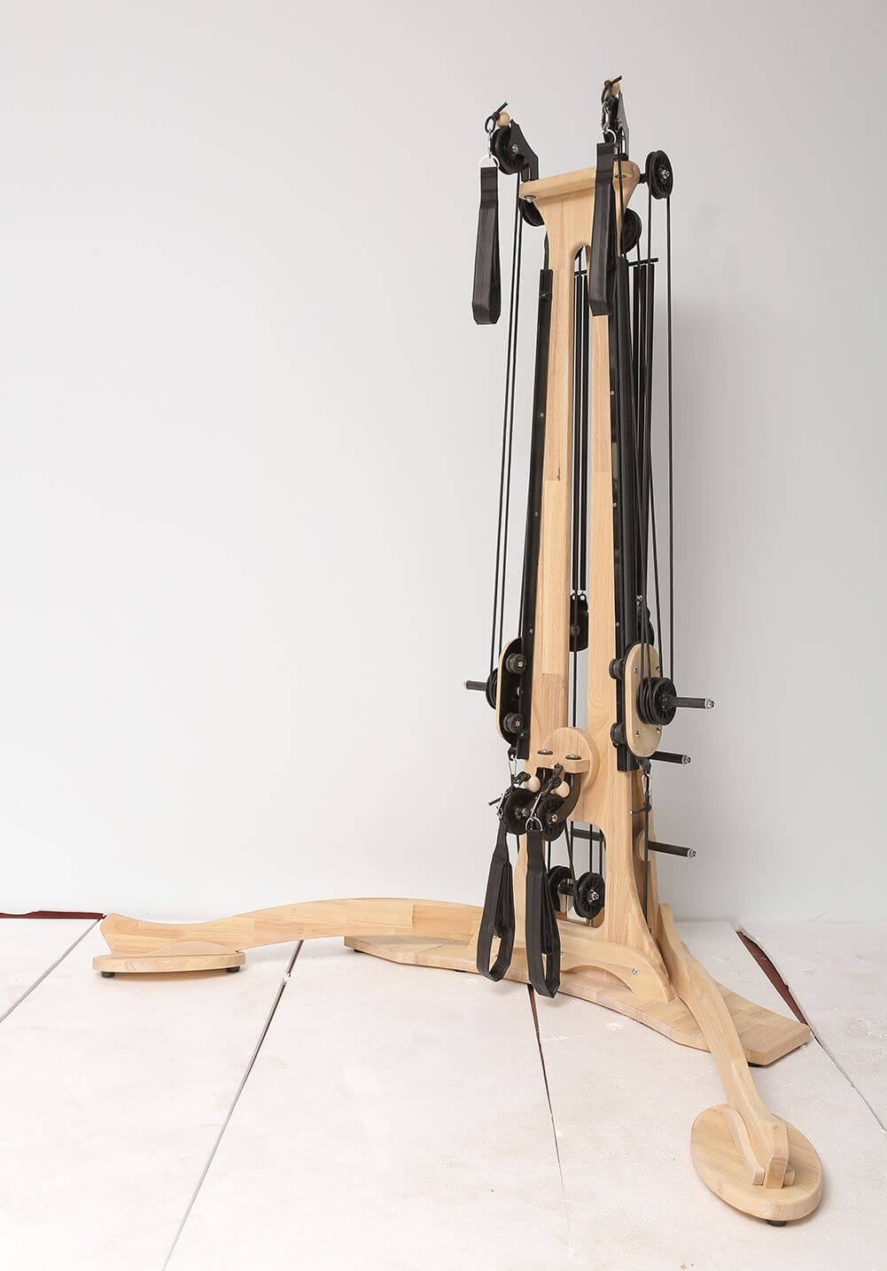 Gyrotonic Combination Pilates Pulley Tower for full-body wellness, available at X-Rival Fitness in Vancouver.